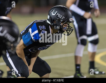 Football action with Trinity vs. University Prep High School in Redding, California. Stock Photo