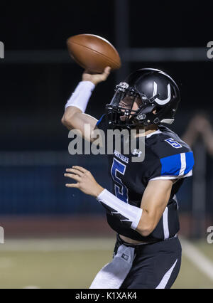 Football action with Trinity vs. University Prep High School in Redding, California. Stock Photo