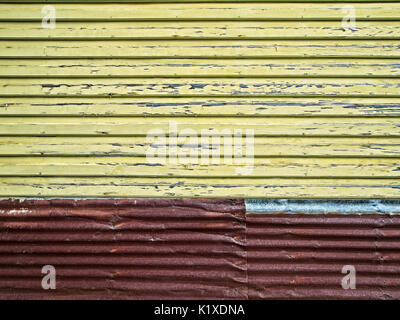 Yellow Paint Wood with Sheet Medal in Old Town TX Stock Photo
