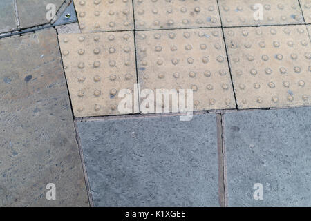 Bland, block paved pavement, urban setting background Stock Photo