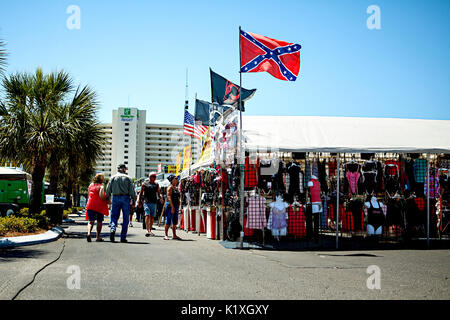 Confederate flag and other wares on sale at Thunder Beach Motorcycle Rally at Panama City Beach, Florida. Stock Photo