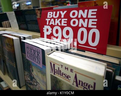 ANGONO, RIZAL, PHILIPPINES - AUGUST 26, 2017: New and old books on sale at a store in a shopping mall. Stock Photo
