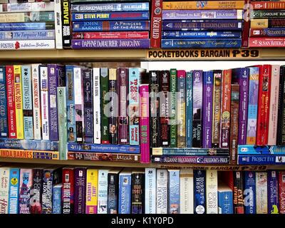 ANGONO, RIZAL, PHILIPPINES - AUGUST 26, 2017: New and old books on sale at a store in a shopping mall. Stock Photo