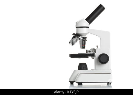 White microscope on table over white background Stock Photo