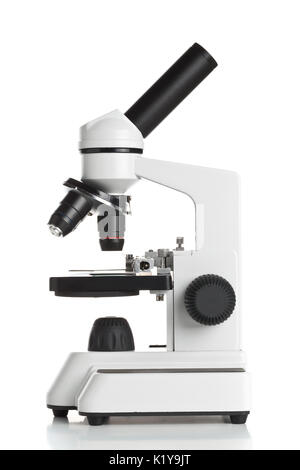 White microscope on table over white background Stock Photo
