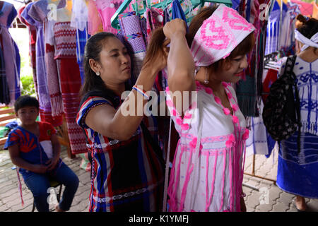 Bangkok, Thailand. 27th Aug, 2017. Members of the Karen with shirt traditional shops as during celebrating hold their Wrist tying ceremony in Bangkok, Thailand. 27 August 2017. Credit: Anusak Laowilas/Pacific Press/Alamy Live News Stock Photo