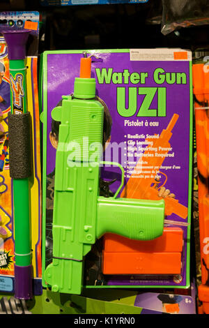An Uzi water gun for sale at the Halloween Adventure on Broadway in Greenwich Village, New York City, Stock Photo