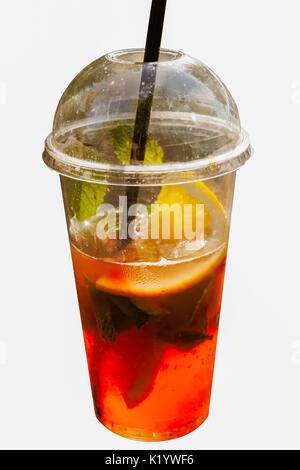 Iced tea in plastic cup with lemon and mint Stock Photo - Alamy