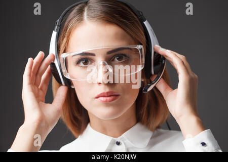 Portrait of call center worker accompanied .Telemarketing operator Stock Photo