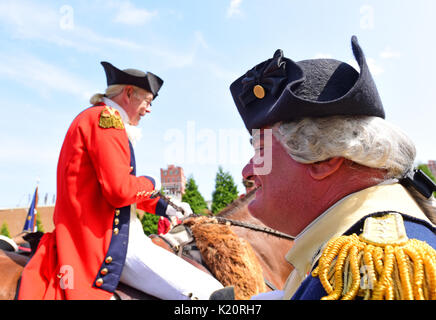 Brooklyn, United States. 26th Aug, 2017. Adversaries in conjunction: George Washington & Lord Cornwallis. Green-Wood Cemetery in Brooklyn staged its annual Battle of Brooklyn recreation, complete with cannon & musket fire, with re-enactors wearing British & colonial period uniforms performing on the cemetery lawn. After the battle, troops led the way to Battle Hill where a brief ceremony took place, with wreaths put into place honoring the 400 Maryland infantry who endured some 70% casualties attacking British positions on the hill top. Credit: Andy Katz/Pacific Press/Alamy Live News Stock Photo