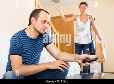 Family couple having the serious conversation at the home Stock Photo