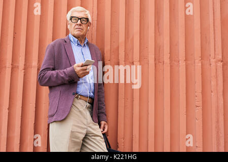 Trendy Senior Man  Posing Outdoors Stock Photo