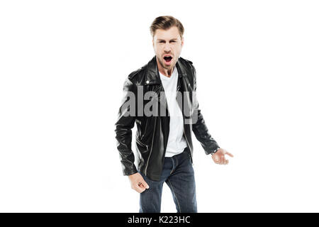 emotional man in leather jacket screaming at camera isolated on white Stock Photo