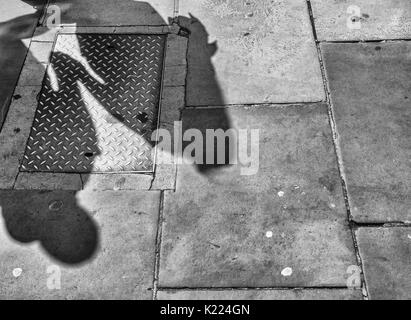 Shadows on pavement, Liverpool, England, UK Stock Photo