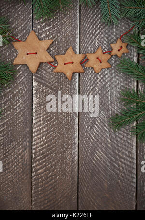 Gingerbread stars on the brown table Stock Photo