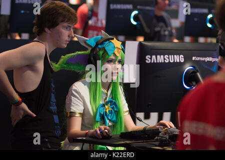 Cologne, Germany - August 24, 2017 - Young people at worlds biggest trade show for video games Gamescom in Cologne playing new games and walking aroun Stock Photo