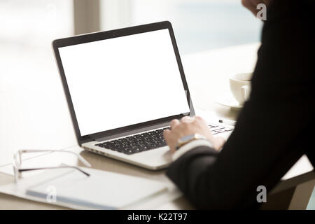 Businessman using pc laptop, mock up blank screen, close up Stock Photo