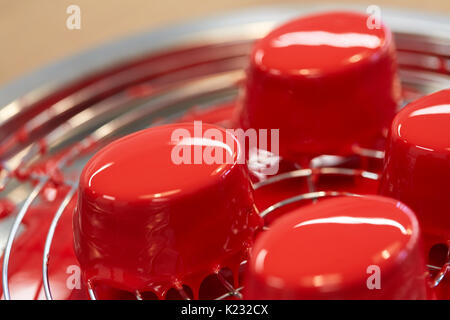 mirror glaze cakes at pastry shop Stock Photo