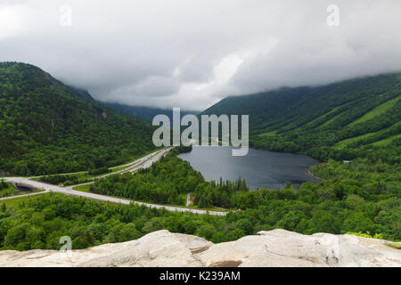 Clouds over Cannon Mountain in Franconia Notch State Park from Artists Bluff in the White Mountains, New Hampshire. Stock Photo