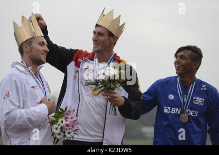 Winners of the Men C1 1000 m final race SEBASTIAN BRENDEL (center, Germany, first place), MARTIN FUKSA (left, Czech, second place) and ISAQUIAS QUEIROZ DOS SANTOS (Brazil, third place), pose with medals during the 2017 ICF Canoe Sprint World Championships in Racice, Czech Republic, on August 26, 2017. (CTK Photo/Katerina Sulova) Stock Photo