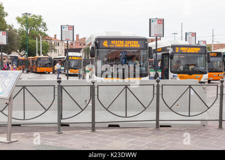 Venice, Veneto, Italy, 28th August 2017. Anti-terror concrete barriers and police presence in Piazzale Roma ahead of the start of the Venice Film Festival. This is the first day after completion of the installation of the barriers to check the viabilty of traffic  flow and pedestrians. Bus drivers sit waiting to depart in their buses behind the barrier. An armoured car was in place on Ponte della Liberta. The barriers are designed to block any vehicular attack. Credit Mary Clarke/Alamy Live news Stock Photo