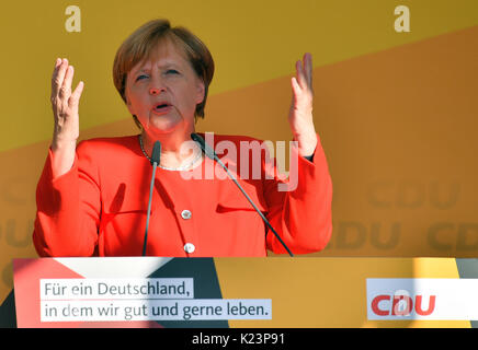 Bitterfeld-Wolfen, Germany. 29th Aug, 2017. German Chancellor Angela Merkel speaks at an election campaign event of the CDU in Bitterfeld-Wolfen, Germany, 29 August 2017. German general elections will be held on 24 September 2017. Credit: dpa picture alliance/Alamy Live News Stock Photo