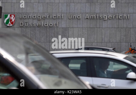Duesseldorf, Germany. 30th Aug, 2017. The building of the district court in Duesseldorf, Germany, 30 August 2017. The scandal concerning the alleged million euro nursing care fraud will be taken before court this Wednesday in Duesseldorf. Photo: Henning Kaiser/dpa/Alamy Live News Stock Photo