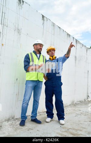 Workers Planning Construction Stock Photo
