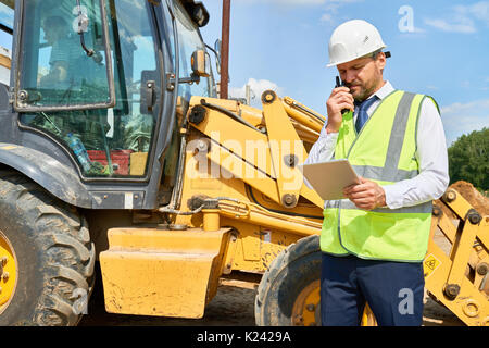 Construction Supervisor Working on Site Stock Photo