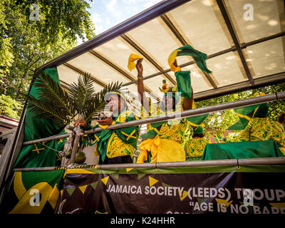 Leeds, UK. 28th August, 2017.  The 50th Leeds West Indian Carnival at Potternewton Park. The carnival was the first in the UK, in 1967, to incorporate all three essential elements of authentic West Indian carnival – costumes, music and a masquerade procession – it is Europe’s longest running Caribbean carnival parade. The event incorporates a colourful procession through the streets, a live music stage and street food and is geared towards all ages and cultures. Photo Bailey-Cooper Photography/Alamy Live News Stock Photo