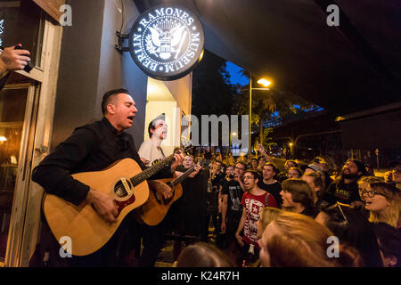 Berlin, Germany. 28th Aug, 2017. Chris #2 and Justin Sane of Anti-Flag perform live on stage during the 'American Fall' acoustic gig at Ramones Museum on August 28, 2017 in Berlin, Germany. Credit: Geisler-Fotopress/Alamy Live News Stock Photo