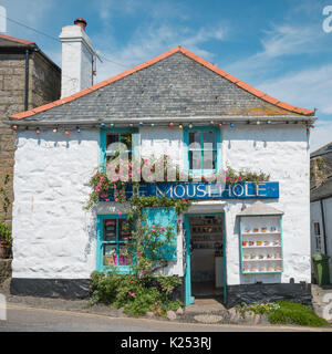 Mousehole shop front in The Pretty Fishing Village of Mousehole in Cornwall Stock Photo