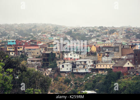 VALPARAISO, CHILE - OCTOBER 27, 2016: Central district of Valparaiso during gloomy weather. Valparaiso is most poorest and dangerous city in Chile. Stock Photo