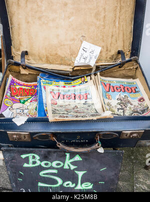 Old comics in second hand shop. UK Stock Photo