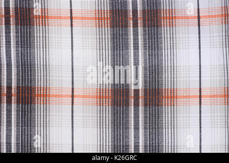 checkered fabric background texture white, black and orange color Stock Photo