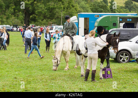 Horses and riders competing at the annual Ceiriog Valley Sheep Dog Trials in Glyn Ceiriog North Wales Stock Photo