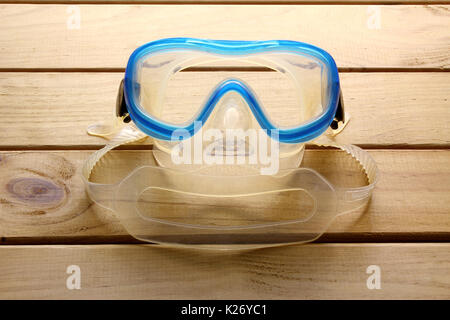 Goggles and Snorkel on Wooden Background Stock Photo