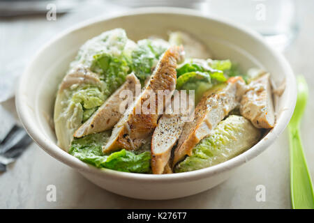 Chicken Ceasar Salad with grilled chicken, parmesan and dressing Stock Photo