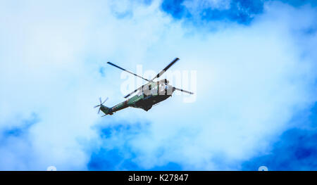 Paris, FRANCE - july 11, 2017: A SA330 Puma helicopter from the Sud-Aviation company of the army overflies the French capital in order to train for th Stock Photo