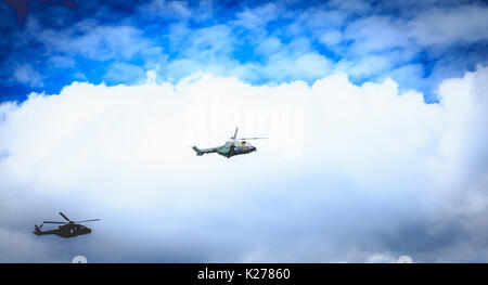 Paris, FRANCE - july 11, 2017: A SA330 Puma helicopter from the Sud-Aviation company of the army overflies the French capital in order to train for th Stock Photo