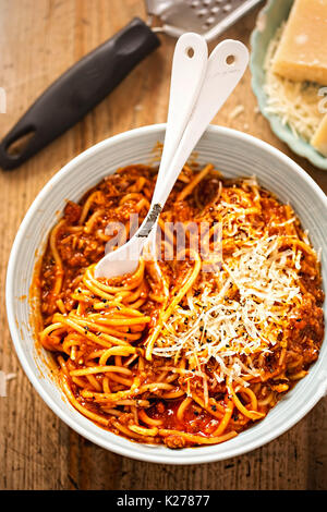 Spaghetti tomato sauce with pork and vegetable in bowl Stock Photo - Alamy
