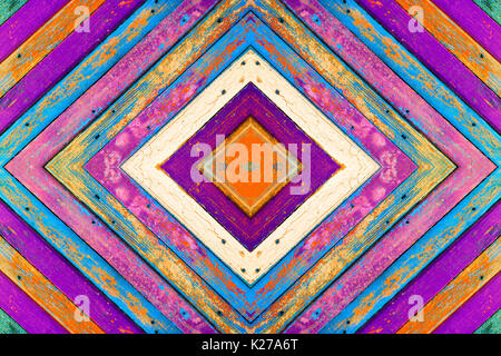 collage of different colored wooden boards with old paint. texture background with a kaleidoscope effect Stock Photo