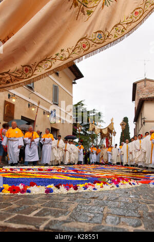 Europe, Umbria, italy, Perugia district, Spello. Artistic sacred figures realized with flowers on the occasion of the Corpus Christi Stock Photo