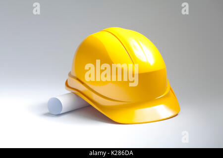 Yellow safety helmet with drawings Stock Photo