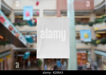 Vertical banner mockup at a shopping mall Stock Photo