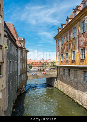 Bamberg, Germany - May 22, 2016: The wall of the old town hall and bridge in downtown of Bamberg, Upper Franconia, Bavaria, Germany. Bamberg is under  Stock Photo