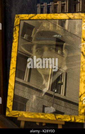 photograph of argentine tango legend carlos gardel, reflections of cityscape, rome, lazio, italy Stock Photo
