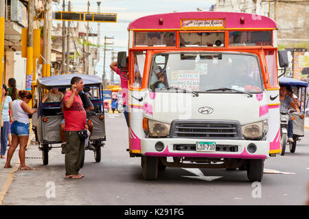 Bus in Iquitos, Peru. The popular form of transport is the most popular in the city after the moto-carros. Stock Photo