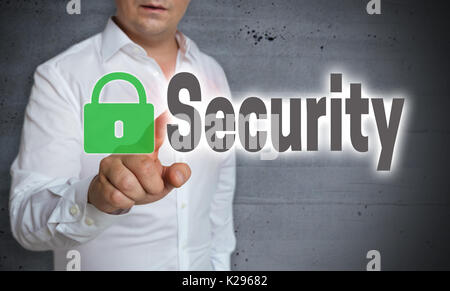 Security touchscreen is operated by man. Stock Photo