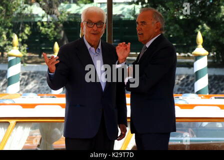 Venice, Italy. 29th August, 2017. Director of the Venice Film Festival Alberto Barbera (R) with Paolo Baratta, President of la Biennale di Venezia (L) speaks during the 74th Venice International Film Festival in Venice Lido, Italy, 29 August 2017.(will run from August 30th to September 9th) Credit: Andrea Spinelli/Alamy Live News Stock Photo